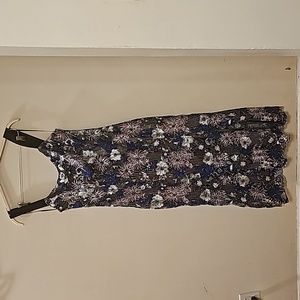 ELLIATT Holiday Edit Collection. Elegant midi-length dress adorned with sequins